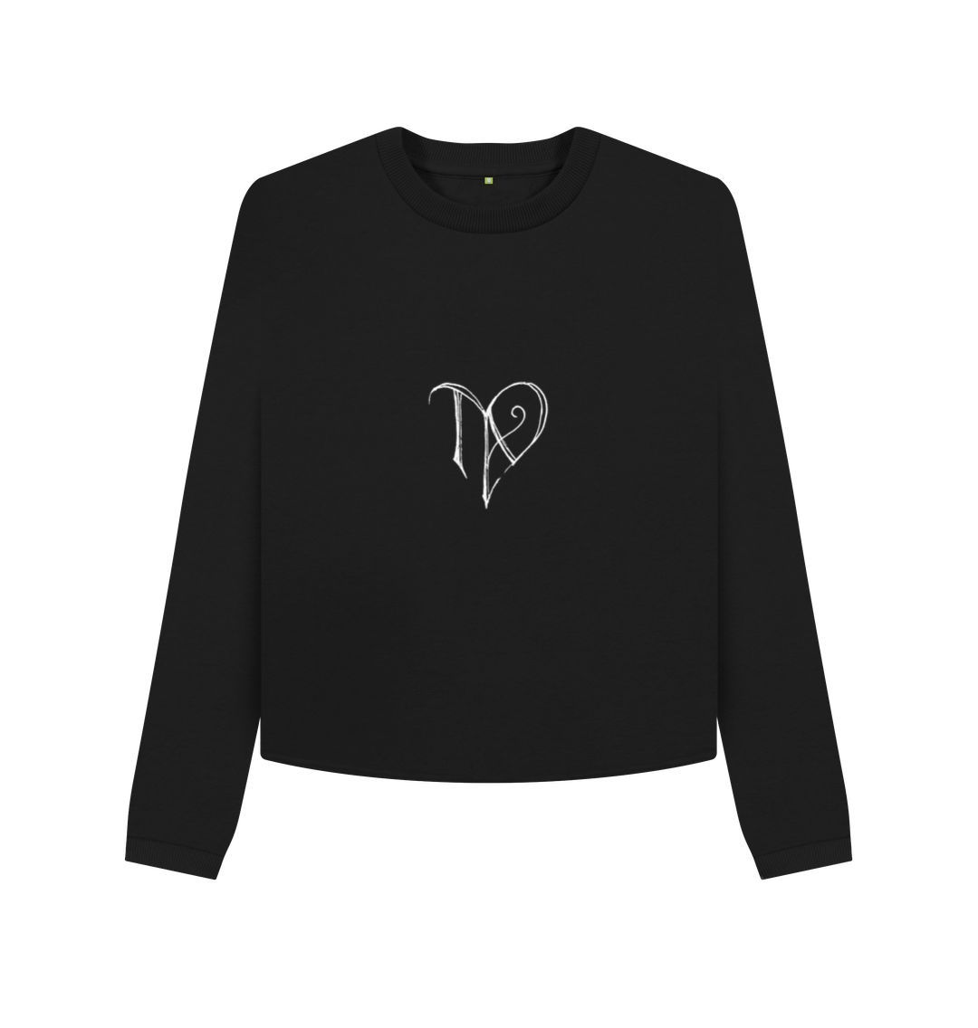 Black TAD logo on boxy jumper