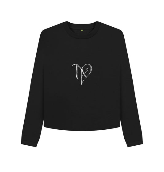 Black TAD logo on boxy jumper